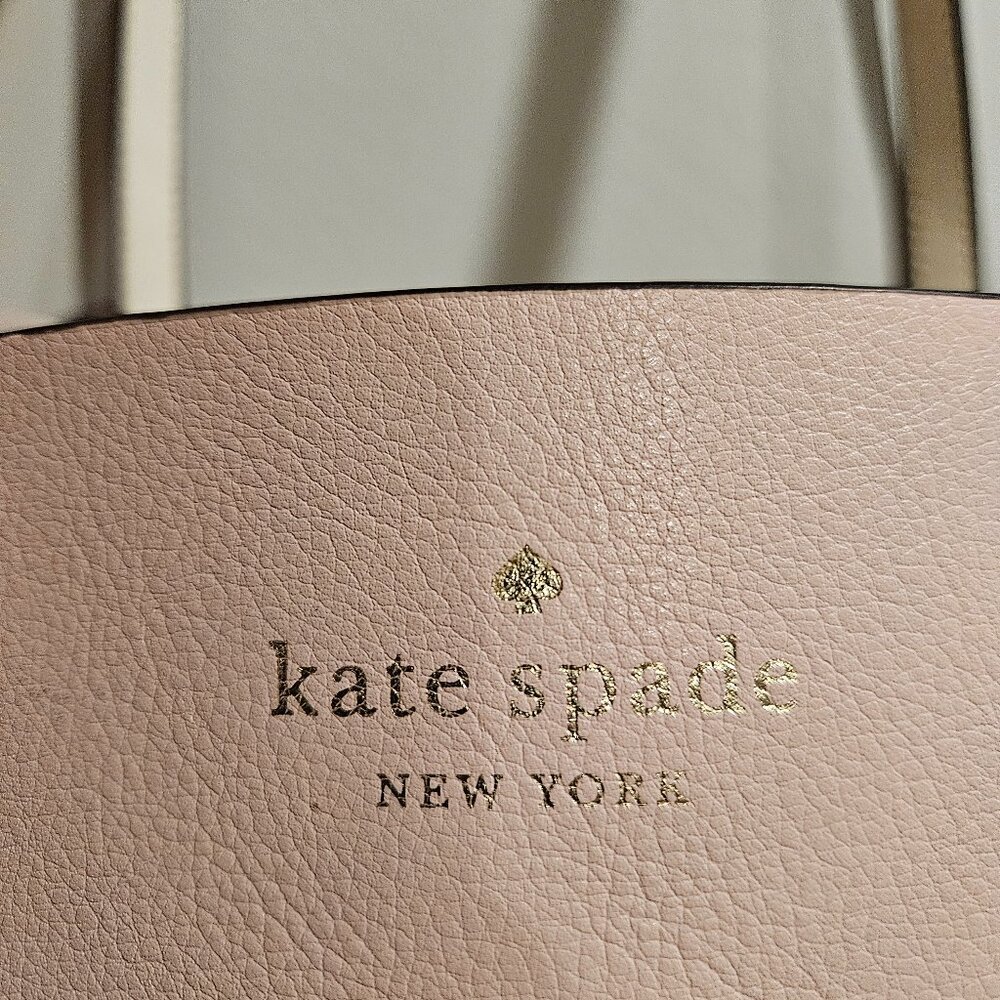 Kate Spade reversible (pink to cream) tote with key fob.